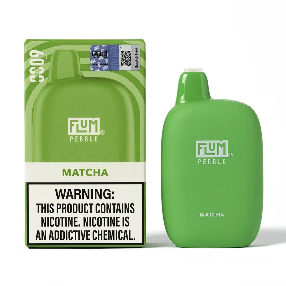 A close-up shot of a flum float vape held in a hand with the transparent tank visible against a pastel background
